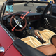 Or you could take this Alfa with these awesome seat covers and a Club. This thing was super rad